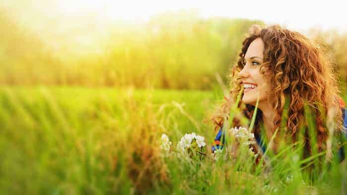 Woman relaxing on the meadow